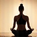 Person holding a foundational Hatha yoga pose with poise and stability.